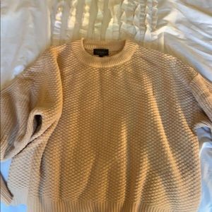 Pink top shop sweater with oversized sleeves.